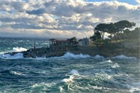 A wonderful scene of stones and aromatic plants by the blue sea on Lošinj.